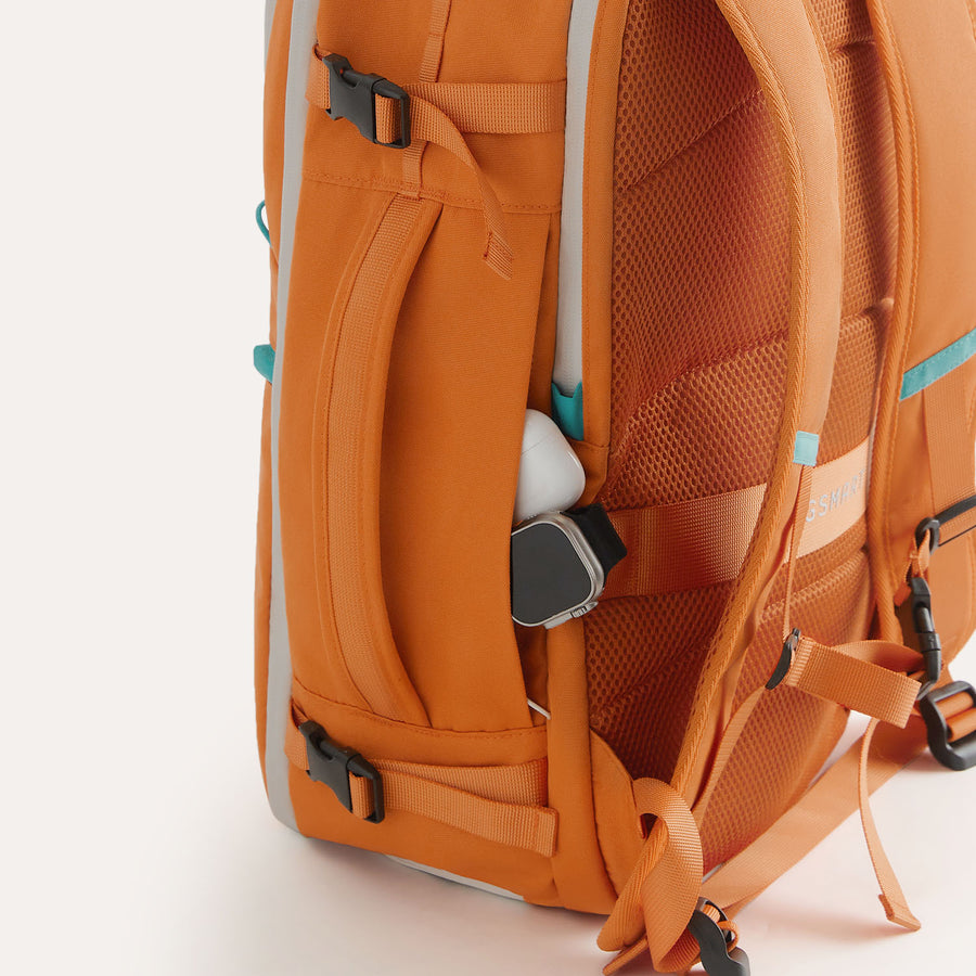 womens_travel_backpack_pockets_rust